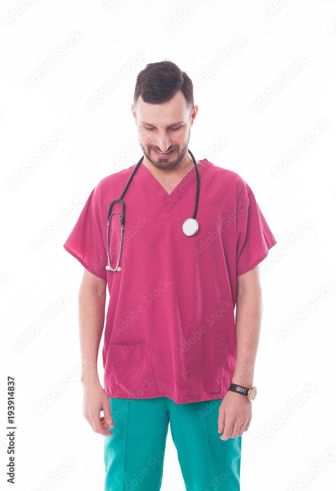 Friendly male doctor on white background. Young assistant in red shirt Friendly male doctor on white background. Young assistant in red shirt