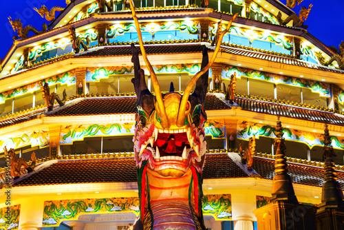 Wat Huai Pla Kung Temple at sunset in Chinag Rai, Thailand photo