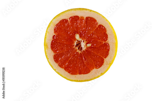 Slice of ripe grapefruit isolated on white background