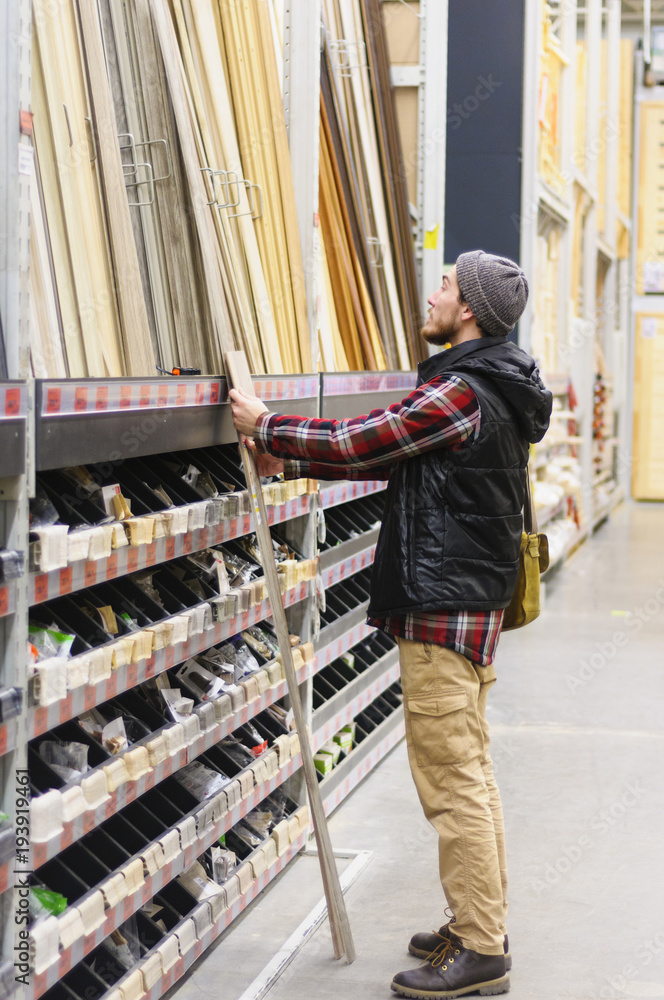 Man in a hardware store Man in a hardware store