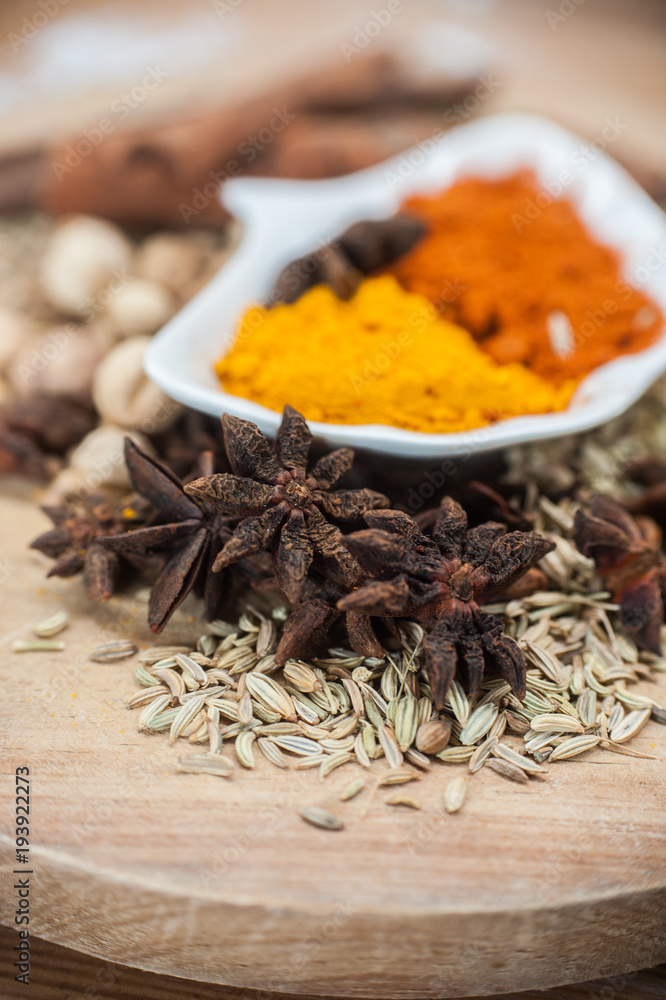 Various spices and herbs on wooden table Various spices and herbs on wooden table
