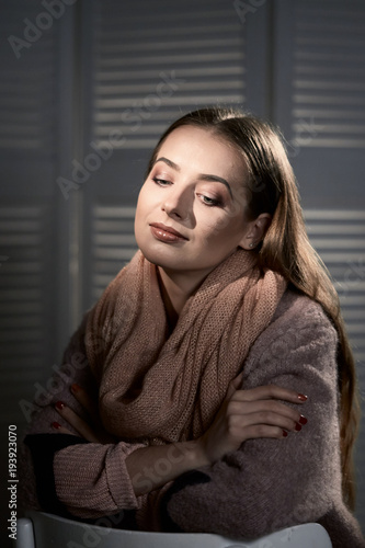 close-up portrait of beautiful girl in studio on black background. © makam1969