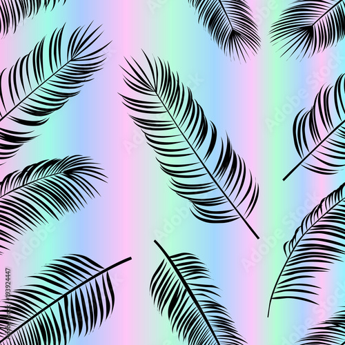 Seamless vector pattern with palm leaves on holofraphic background.