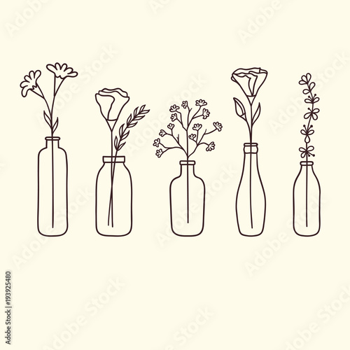 Set of cute hand drawn flowers in bottles