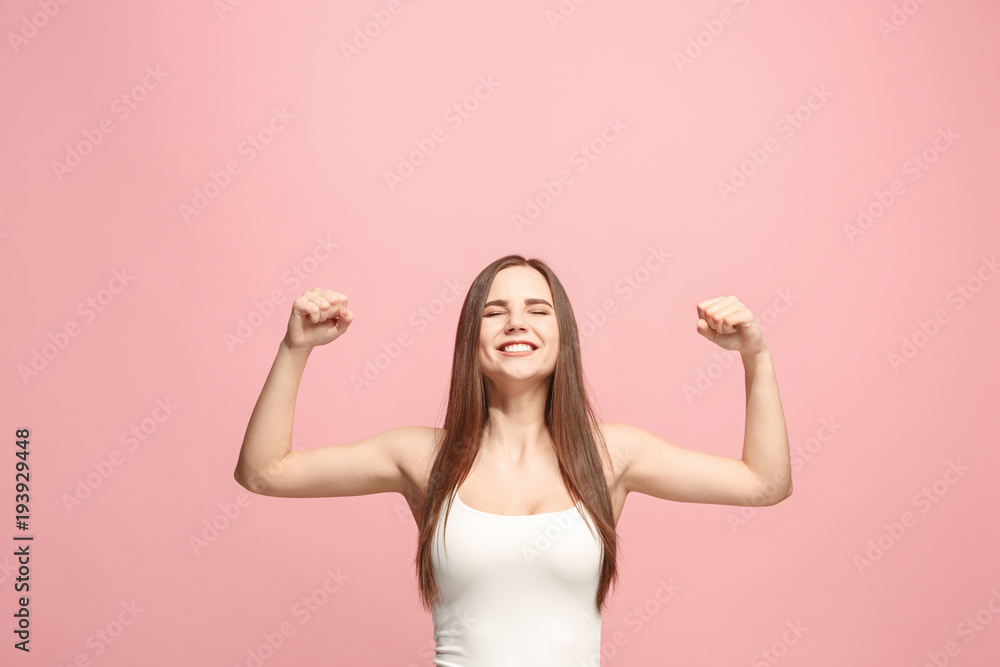 Winning success woman happy ecstatic celebrating being a winner. Dynamic energetic image of female model Winning success woman happy ecstatic celebrating being a winner. Dynamic energetic image of female model