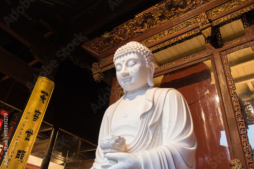 Canvas Print close-up of Buddhist God statue in the ancient longhua temple