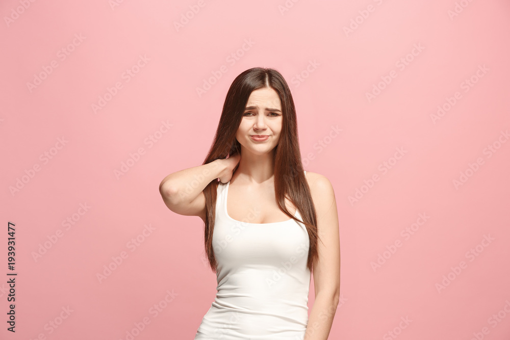 Let me think. Doubtful pensive woman with thoughtful expression making choice against pink background Let me think. Doubtful pensive woman with thoughtful expression making choice against pink background