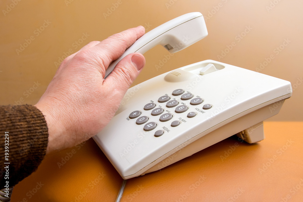 an employee of office takes telephone receiver, an important telephone conversation, solving business problems an employee of office takes telephone receiver, an important telephone conversation, solving business problems
