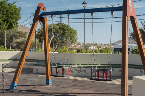 Swings in a childrens playground 