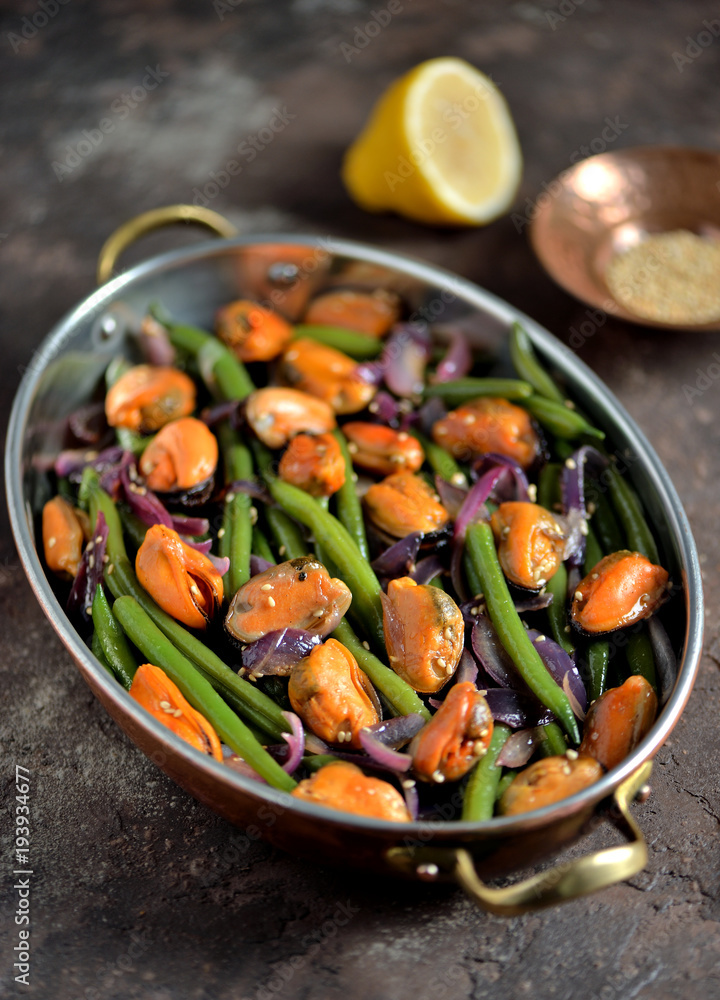 Green beans with mussels, red onions and sesame. Healthy vegetarian food. Green beans with mussels, red onions and sesame. Healthy vegetarian food.