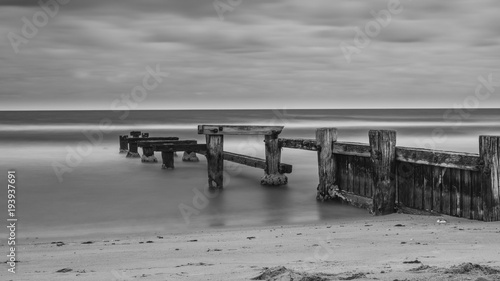 The old Mentone Beach Jetty in black and white