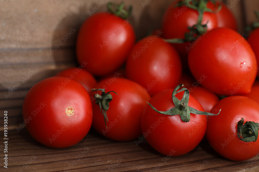 Fresh bright and juicy tomatoes on the kitchen Fresh bright and juicy tomatoes on the kitchen