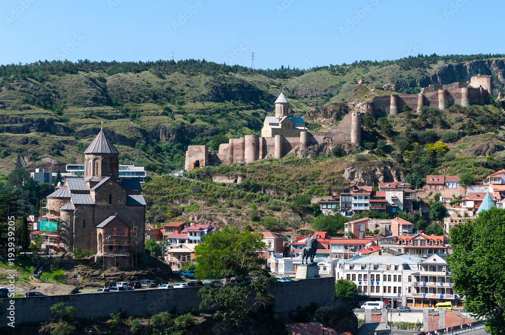 Panoramic view of Narikala Fortress in Old Tbillisi and Metekhi Church, Tbilisi, Georgia