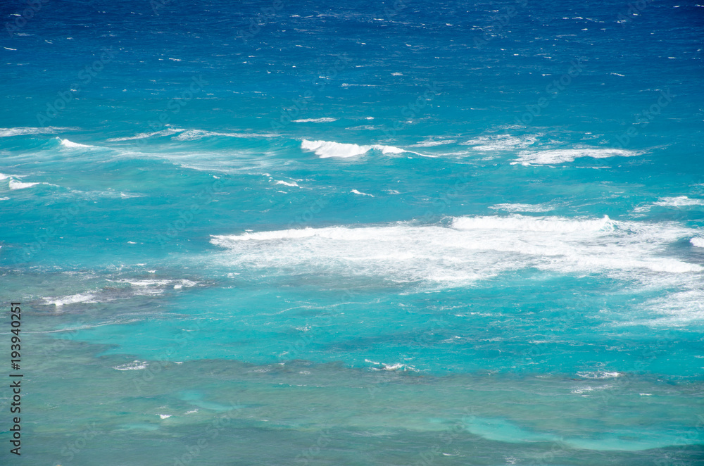 Bright Bllue Ocean with white waves in Caribbean