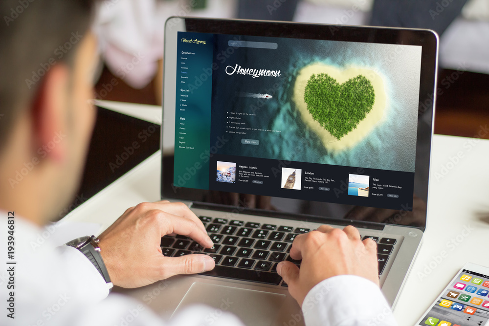 businessman planning honeymoon with computer businessman planning honeymoon with computer