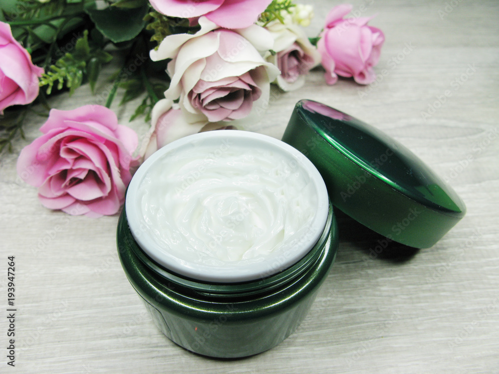 cosmetic cream for face care and rose flowers cosmetic cream for face care and rose flowers
