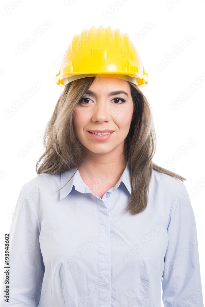 Portrait of female constructor posing and smiling. Portrait of female constructor posing and smiling.