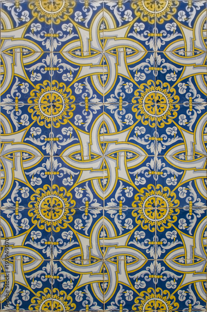 blue and yellow portuguese mosaic made of ceramic tiles