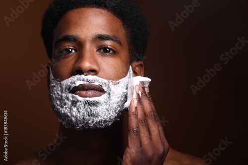 Beautiful man shaving photo