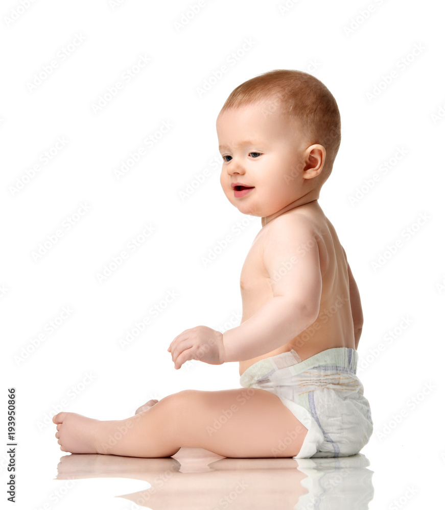 Infant child baby boy toddler sitting naked in diaper Infant child baby boy toddler sitting naked in diaper