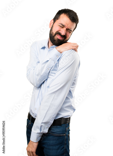 Handsome man with beard with shoulder pain