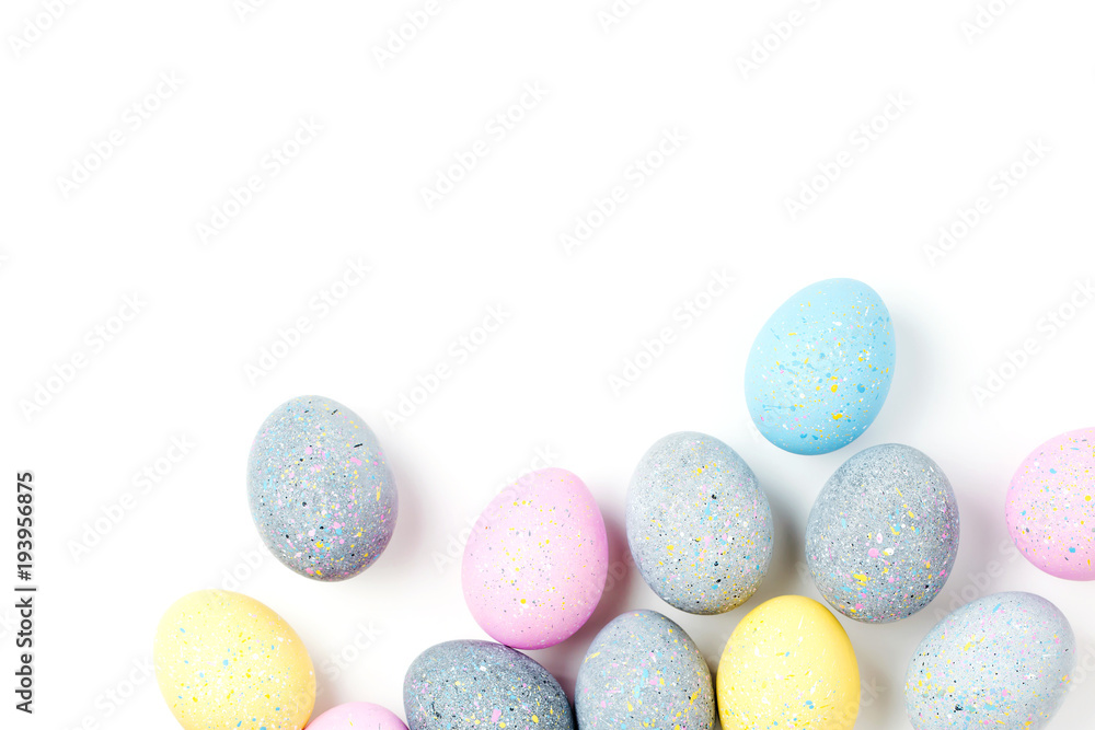 Background with pale pink, blue, yellow and gray Easter eggs. Compositions in pastel colors. Easter concept Background with pale pink, blue, yellow and gray Easter eggs. Compositions in pastel colors. Easter concept