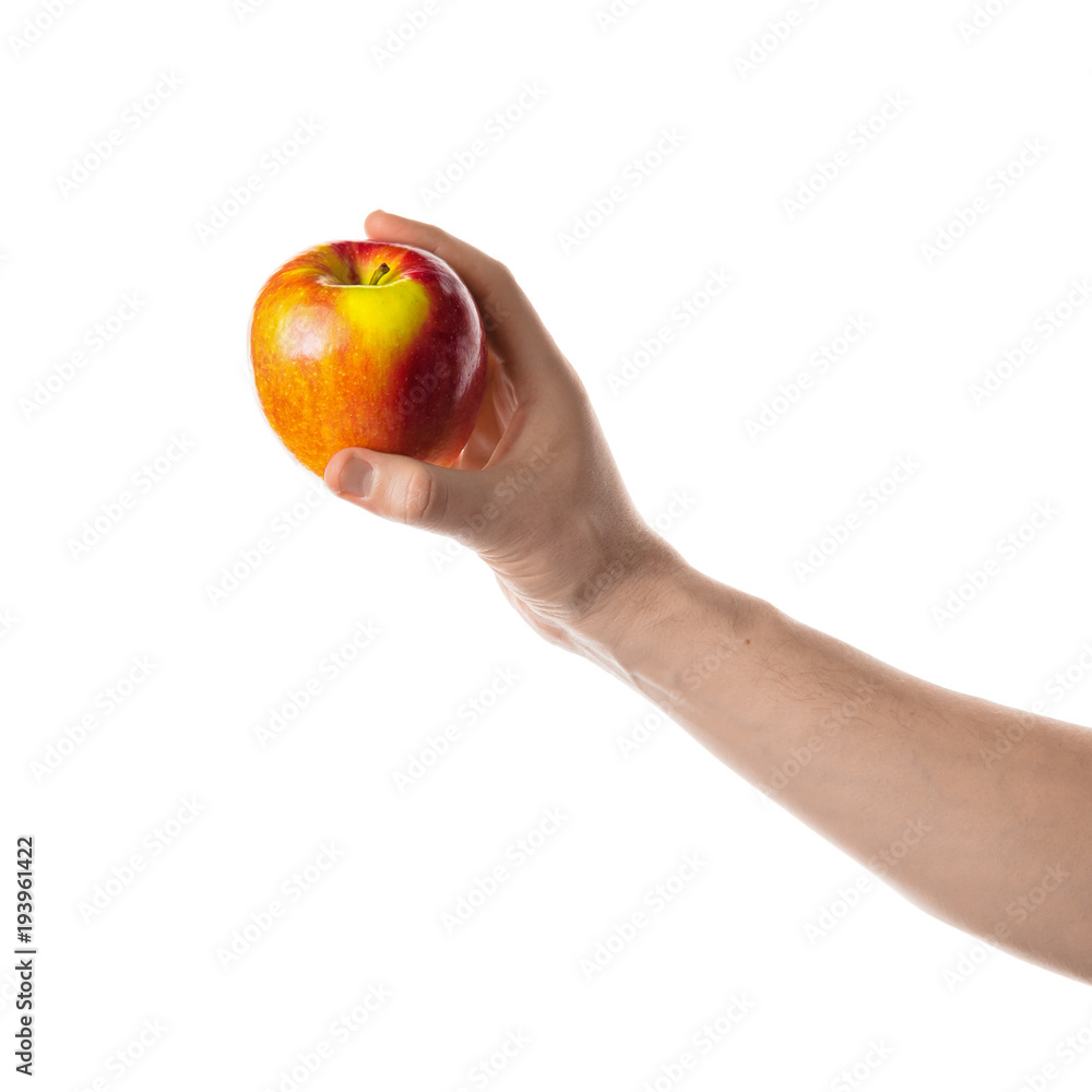 Apple. Male hand holding red apple. Isolated on white background. Apple. Male hand holding red apple. Isolated on white background.