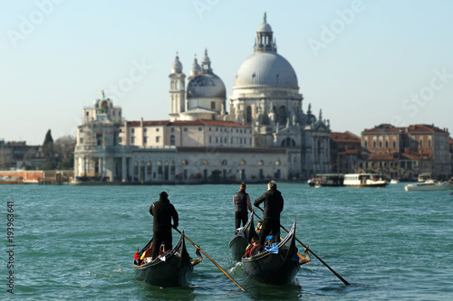 Venice: Gondolas on the Canal Grande, Basilica di Santa Maria della Salute in the background. © pixelleo