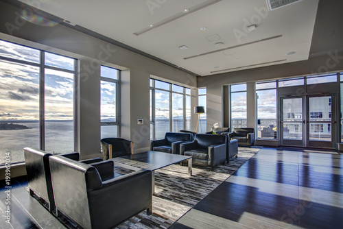 Light lounge area with view of Elliott Bay waters.