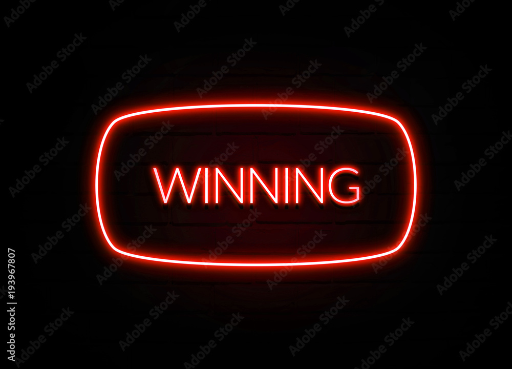 Winning neon sign on brick wall background. Winning neon sign on brick wall background.