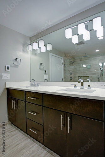 Elegant bathroom with espresso double vanity