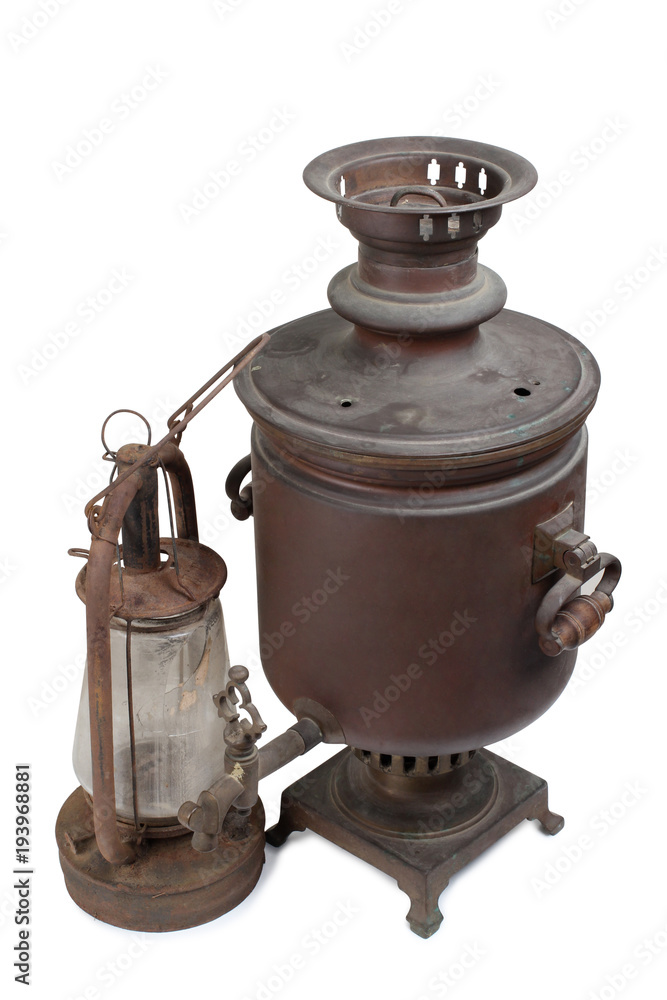 Ancient metal samovar on a white background Ancient metal samovar on a white background