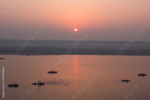 The sunrise over the Ganges river in Varanasi.