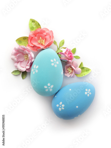 easter eggs and flowers isolated on white background