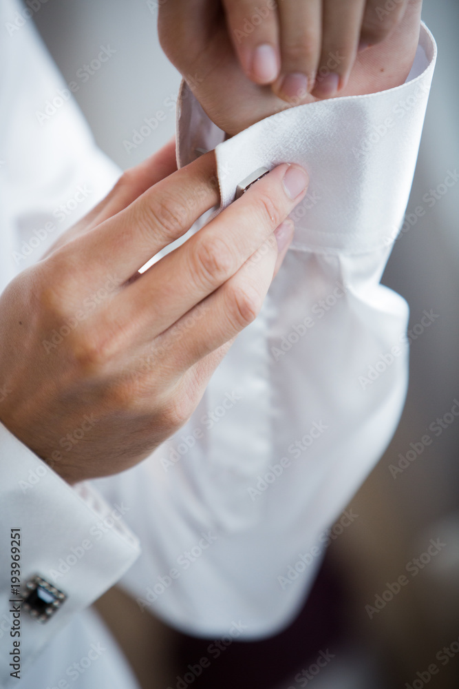 groom dressing groom dressing