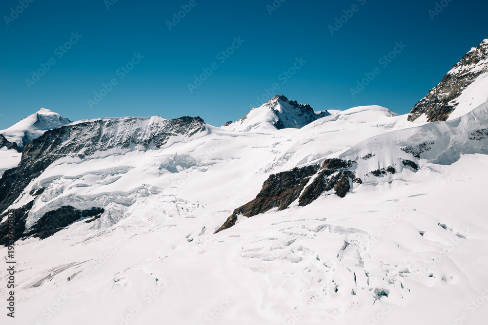Snowy mountain at Jungfrau peak in Switzerland