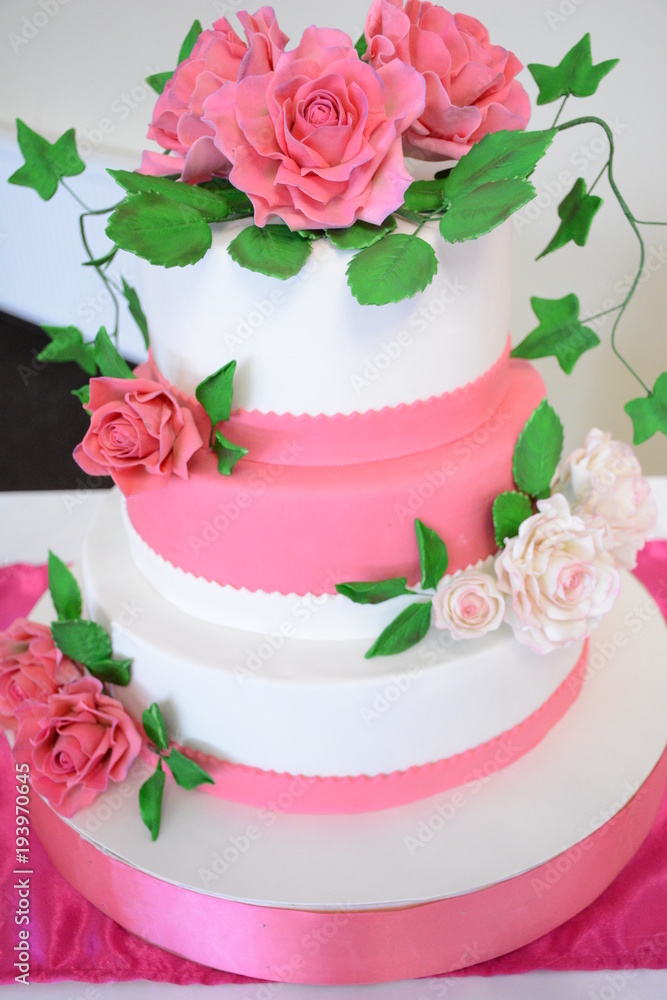 A large wedding cake. A large wedding cake.