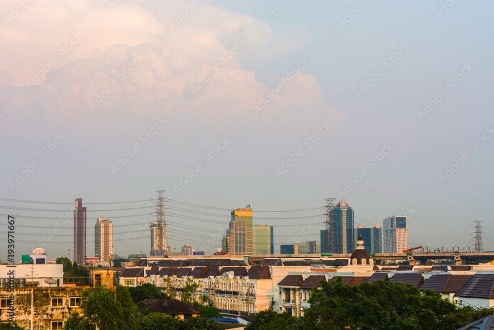 Thailand's capital, Bangkok, seen from afar, high voltage towers and high speed rail construction.
