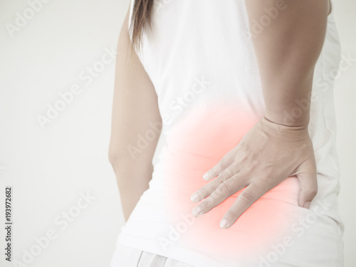 Wallpaper Mural Close up woman having pain in injured back. Health care and back pain concept. Torontodigital.ca