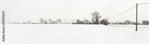 Gigapano of a typical Flemish countryside landscape with farms in winter photo