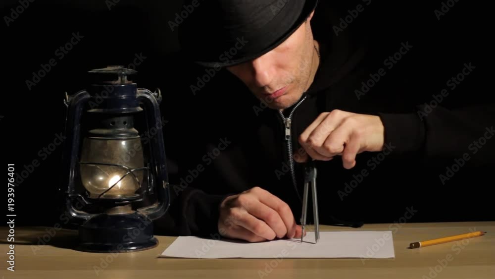 man draws a drawing man draws a drawing