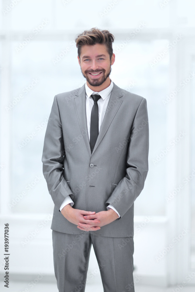 A young man in a gray suit A young man in a gray suit