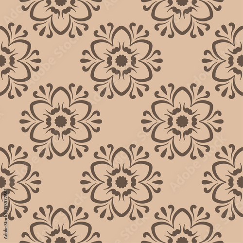 Brown floral seamless design on beige background