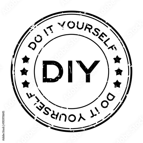 Grunge black DIY word (Abbreviation of Do it yourself) round rubber seal stamp on white background