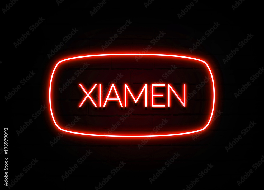 Xiamen neon sign on brick wall background. Xiamen neon sign on brick wall background.
