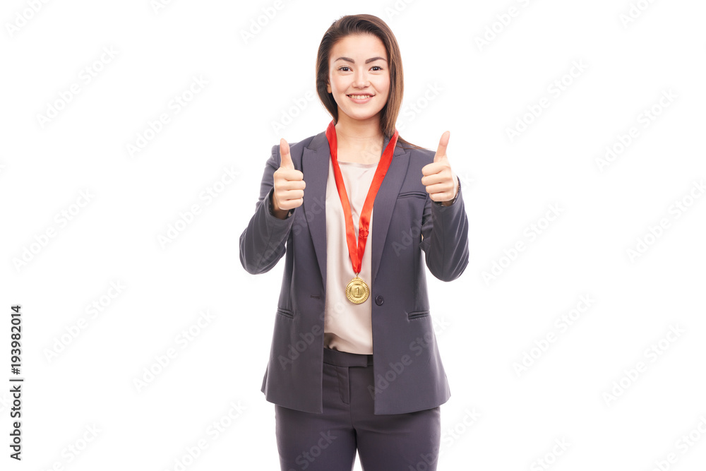 Young businesswoman wearing golden medal on red ribbon Young businesswoman wearing golden medal on red ribbon