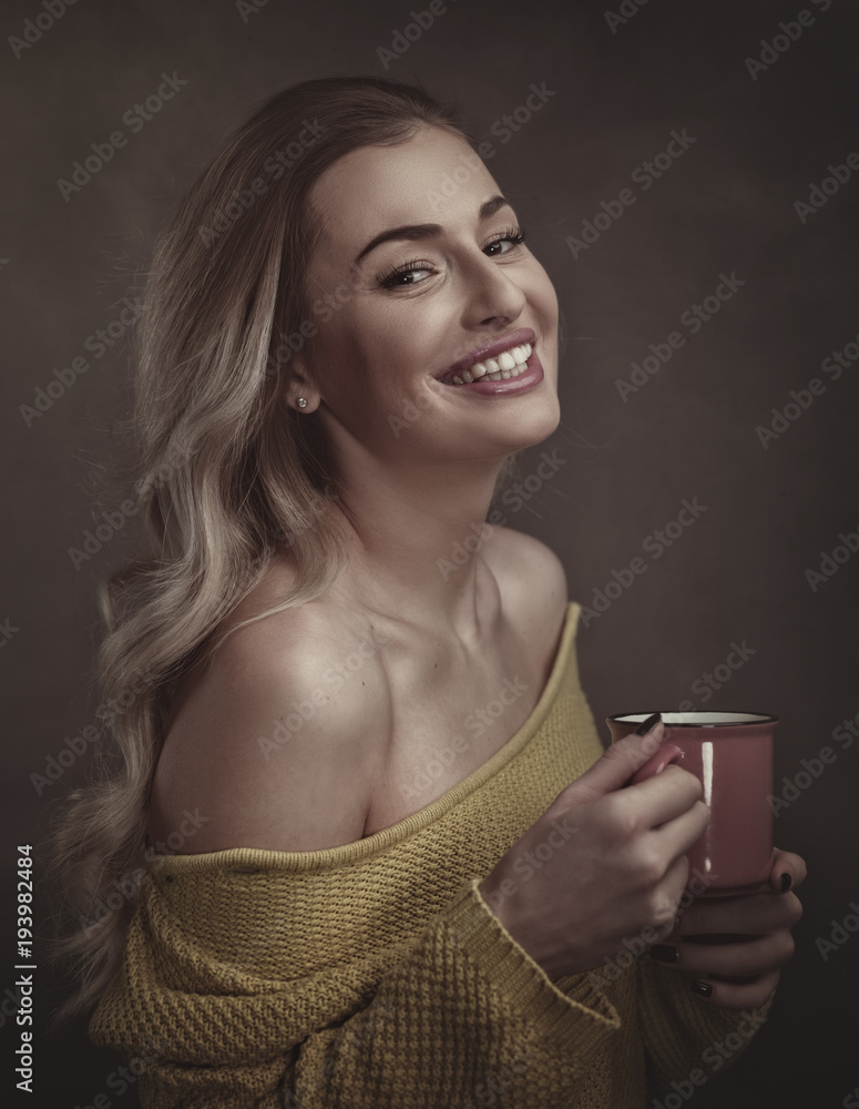 Early morning with scented coffee. Beauty female portrait with cup of drink Early morning with scented coffee. Beauty female portrait with cup of drink