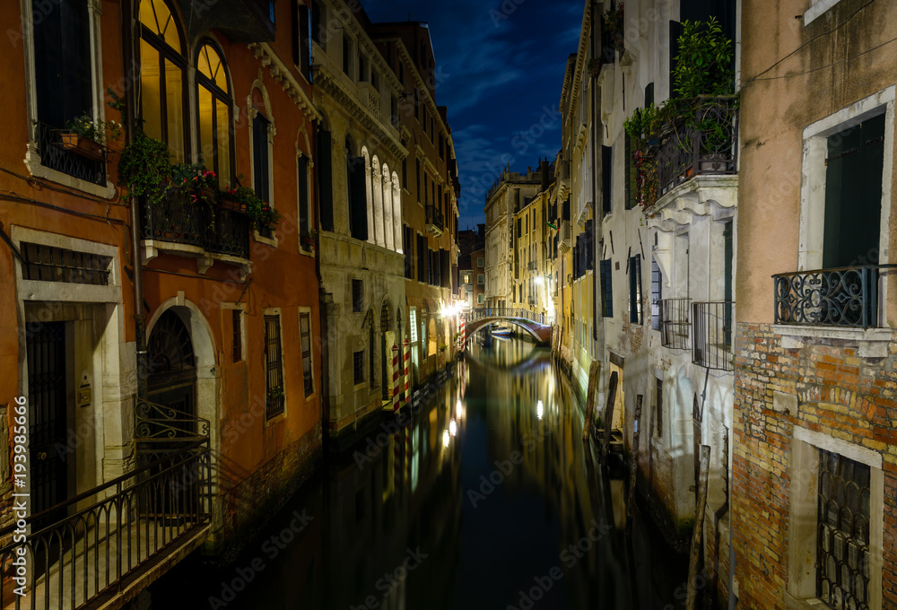 Long night exposure of an old Venetian canal in horizontal view