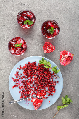 Fototapeta Naklejka Na Ścianę i Meble -  cold pomegranate juice with ice cubes