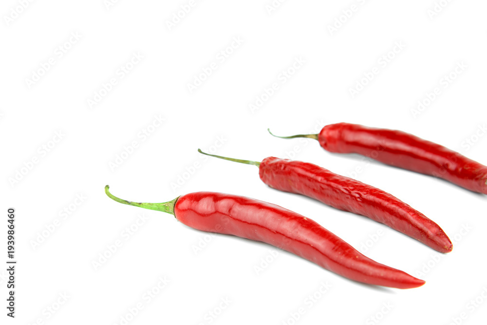 Red chili on white background. Food and vegetable concept. Red chili on white background. Food and vegetable concept.